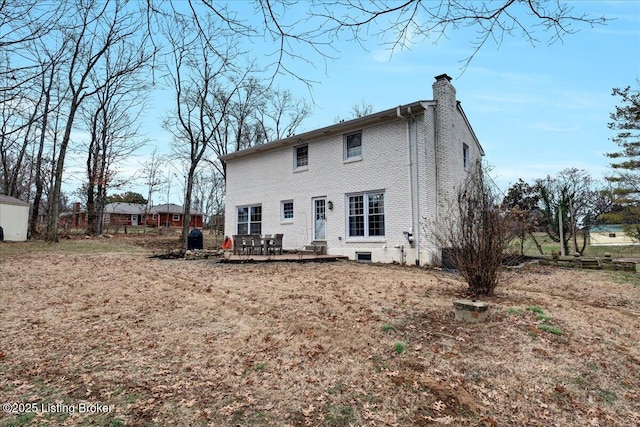 back of property featuring a patio