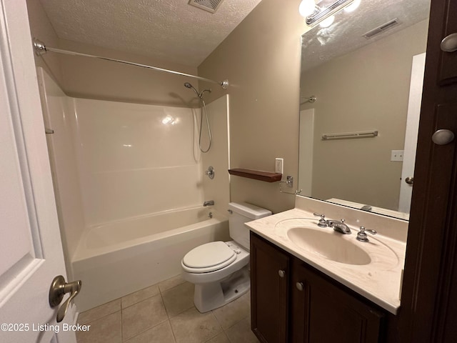 full bathroom with shower / tub combination, tile patterned flooring, vanity, a textured ceiling, and toilet