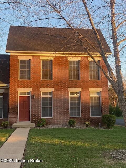 colonial house with a front lawn