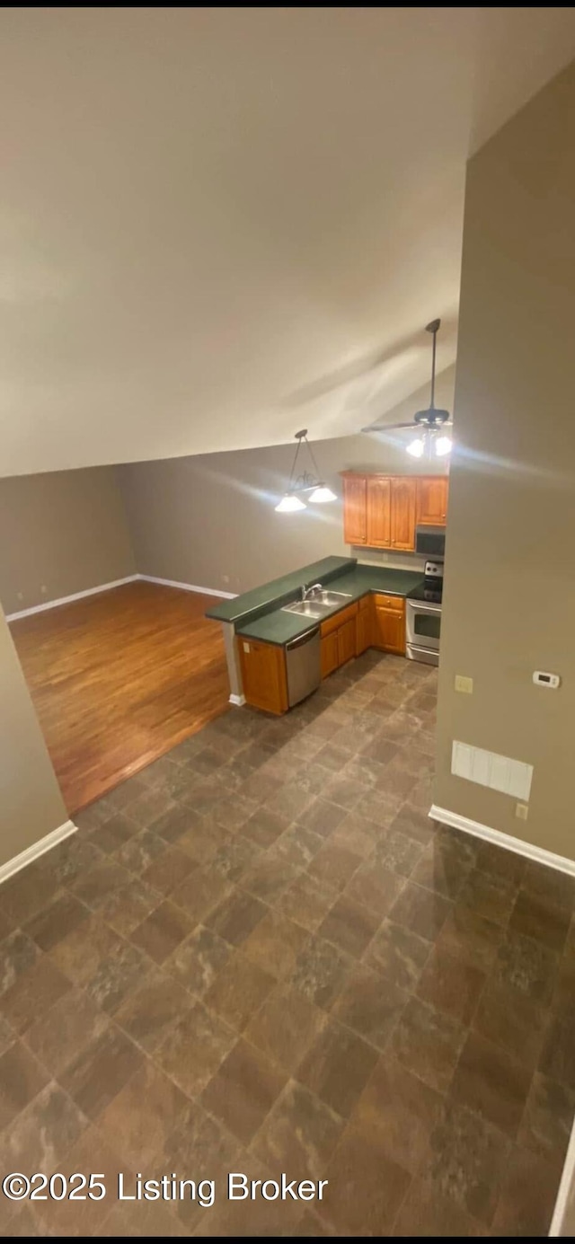 interior space with vaulted ceiling and sink