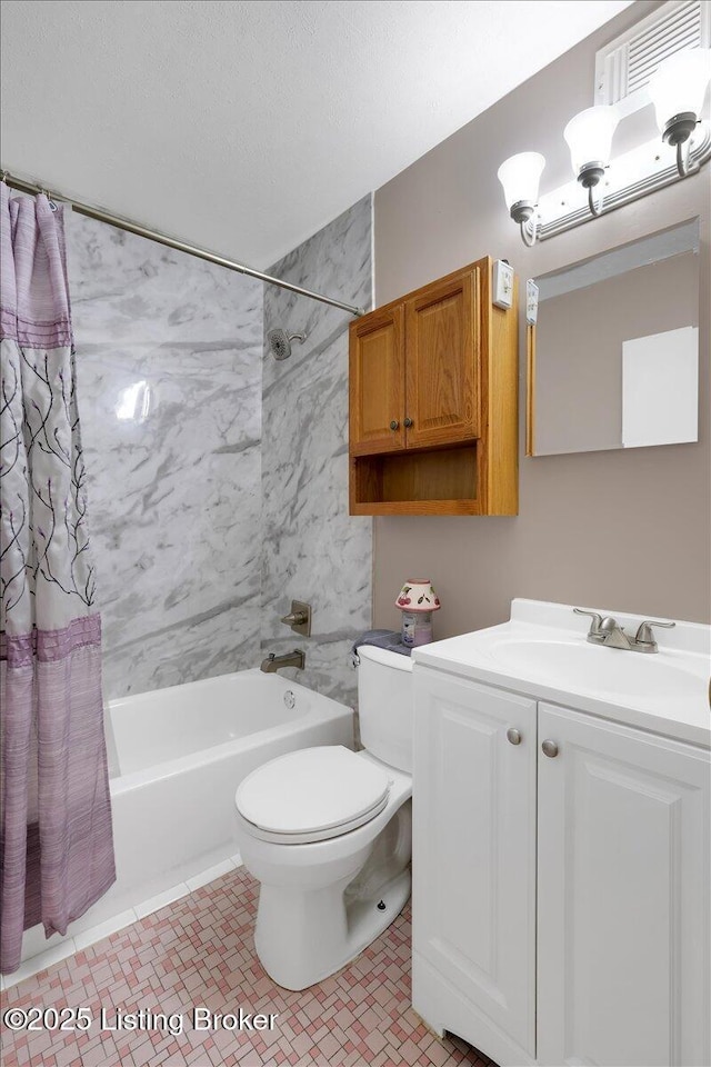 full bathroom featuring shower / tub combo with curtain, vanity, toilet, and tile patterned floors