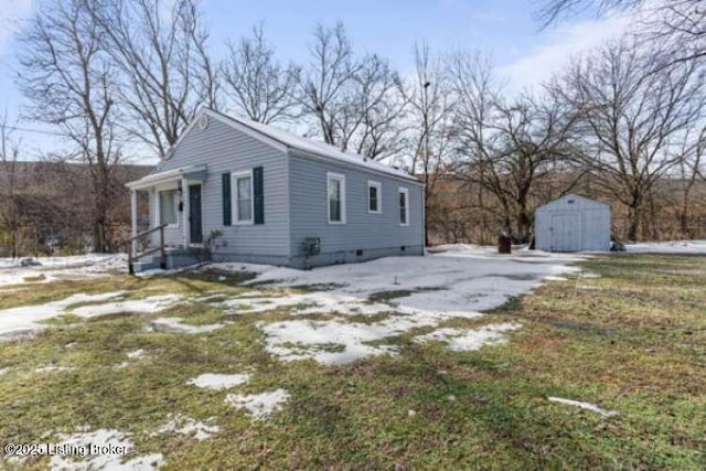 view of home's exterior featuring a shed