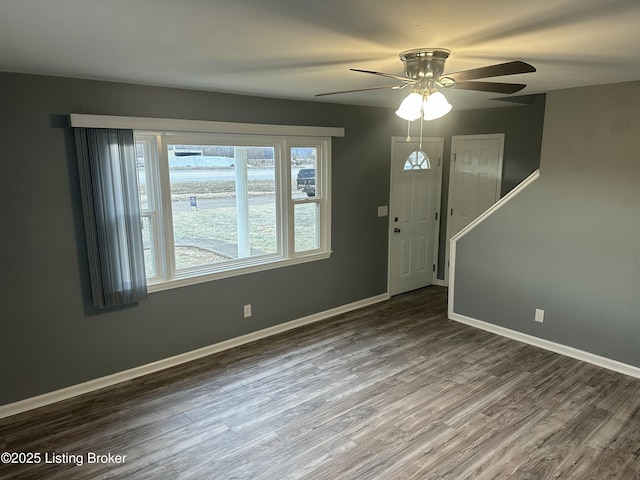 entryway featuring ceiling fan and wood-type flooring