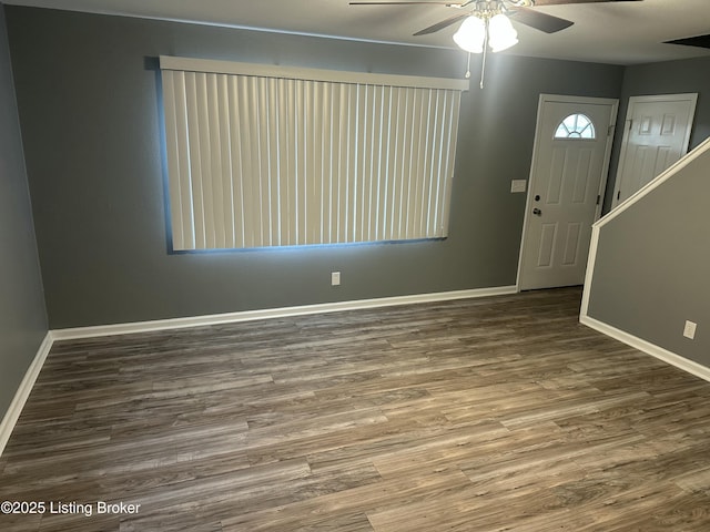 entryway featuring ceiling fan, baseboards, and wood finished floors