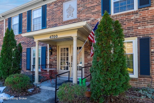 doorway to property featuring a porch