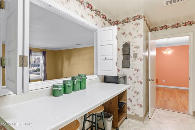 bathroom featuring crown molding