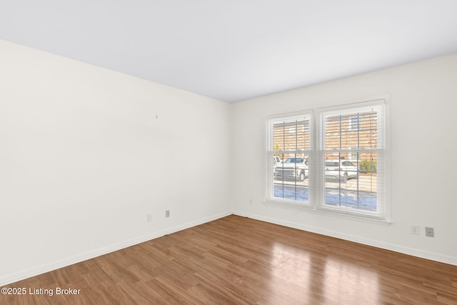 empty room featuring hardwood / wood-style floors