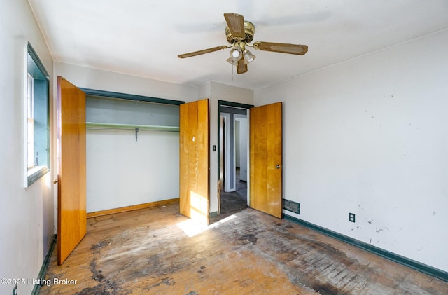 unfurnished bedroom with a closet and ceiling fan