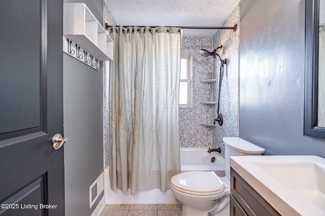 bathroom with a textured ceiling, toilet, shower / tub combo, visible vents, and vanity