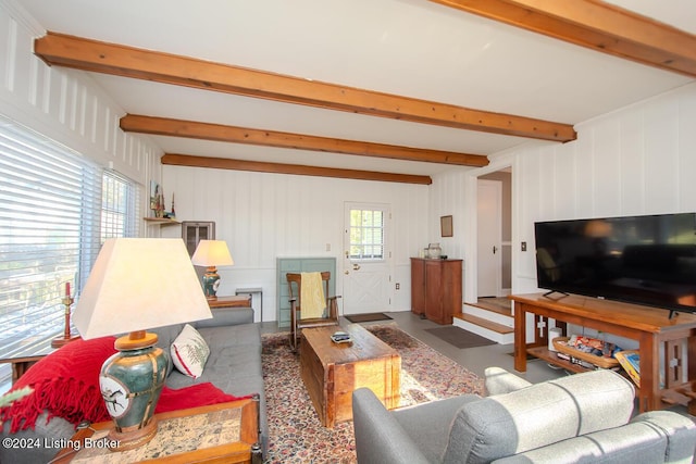 living room with beamed ceiling