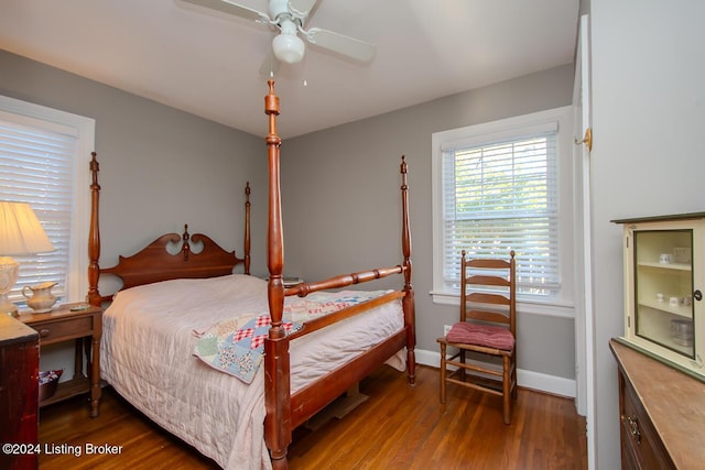 bedroom featuring hardwood / wood-style flooring and ceiling fan