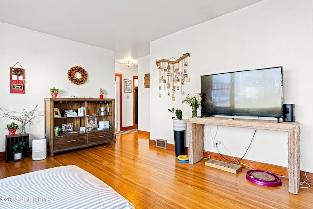 living room featuring wood-type flooring