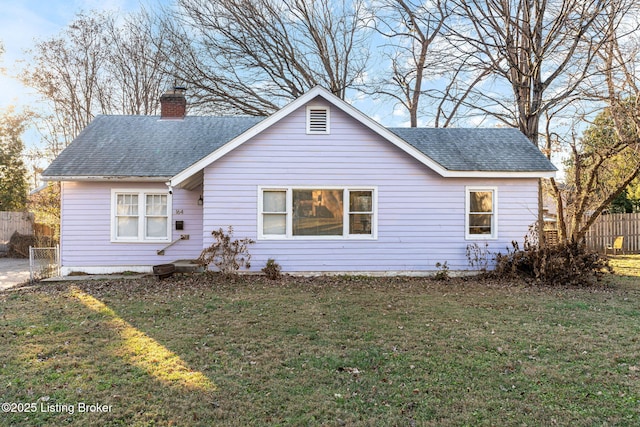 view of front of property with a front lawn