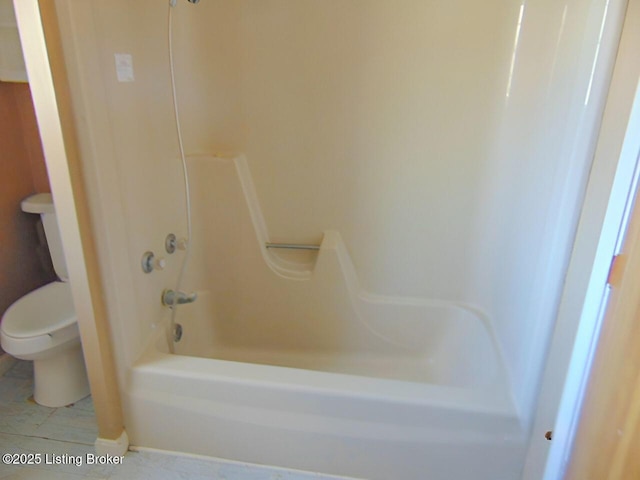 bathroom with  shower combination, toilet, and tile patterned flooring