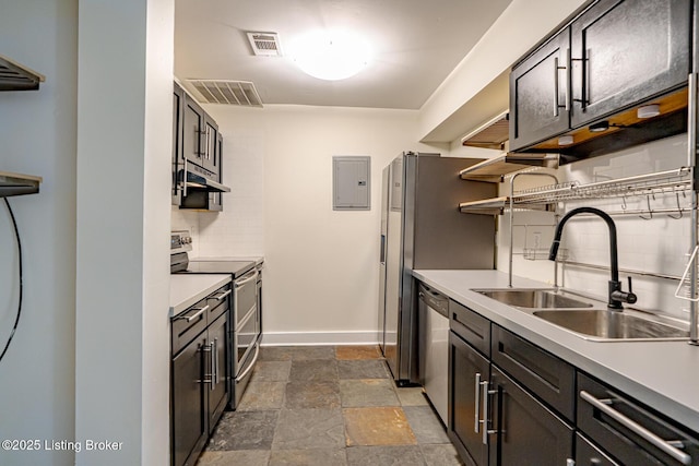 kitchen featuring stainless steel appliances, open shelves, a sink, and visible vents