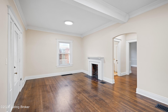 unfurnished living room with beamed ceiling, crown molding, a brick fireplace, and dark hardwood / wood-style floors