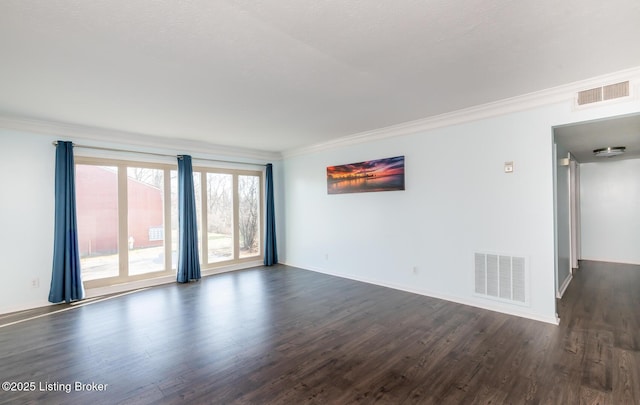 unfurnished room featuring crown molding and dark wood-type flooring