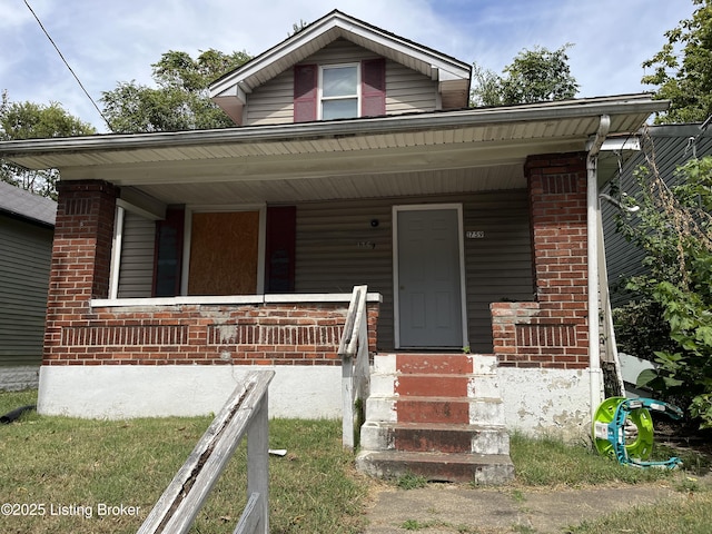 bungalow-style house featuring a porch