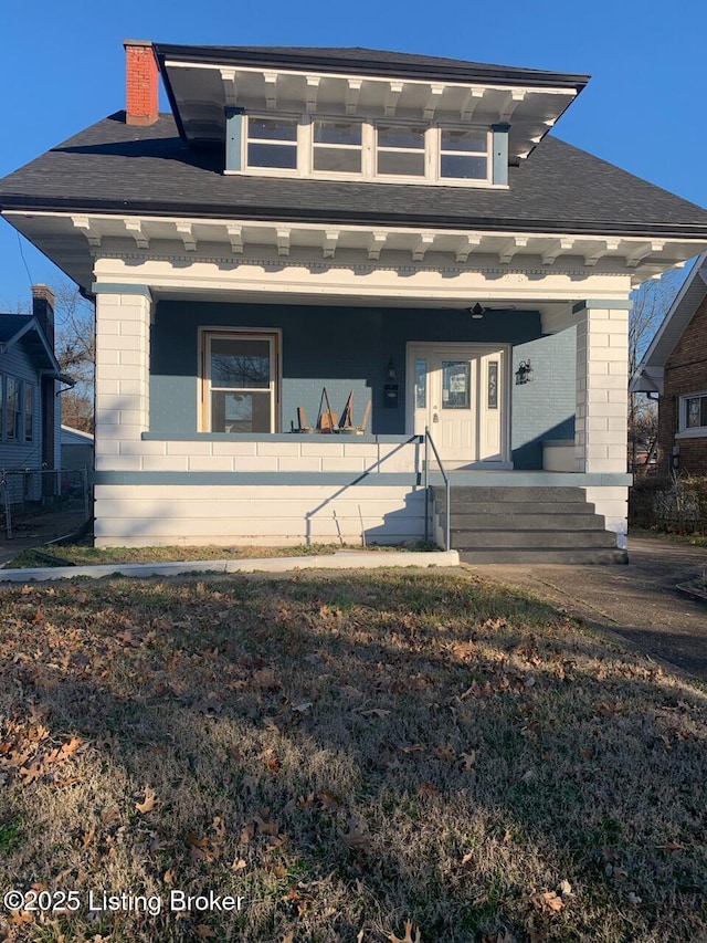 view of front of property featuring covered porch