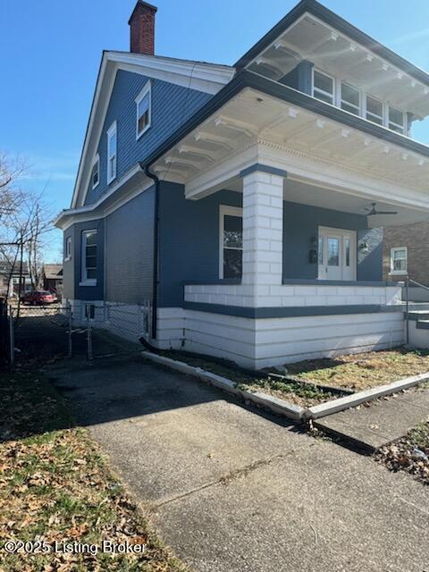 view of home's exterior featuring covered porch