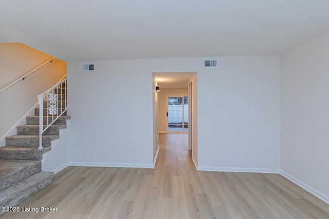 empty room with light wood-type flooring