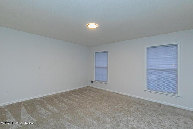 empty room with light carpet