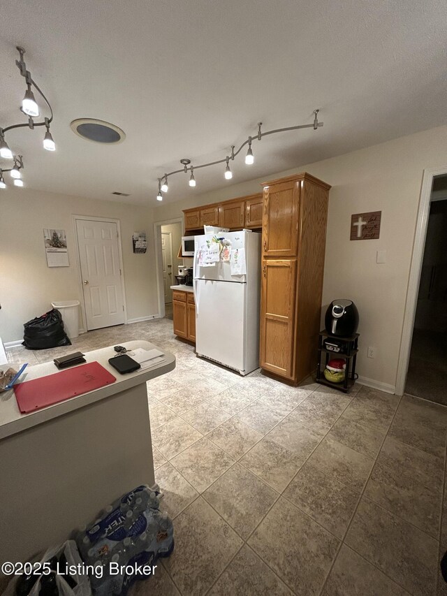 kitchen featuring white appliances