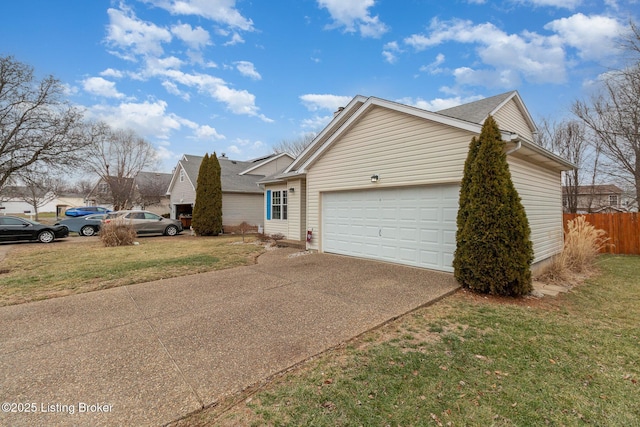 view of side of home with a yard and a garage