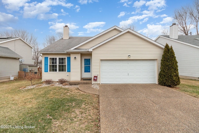 view of front of house with a garage and a front lawn