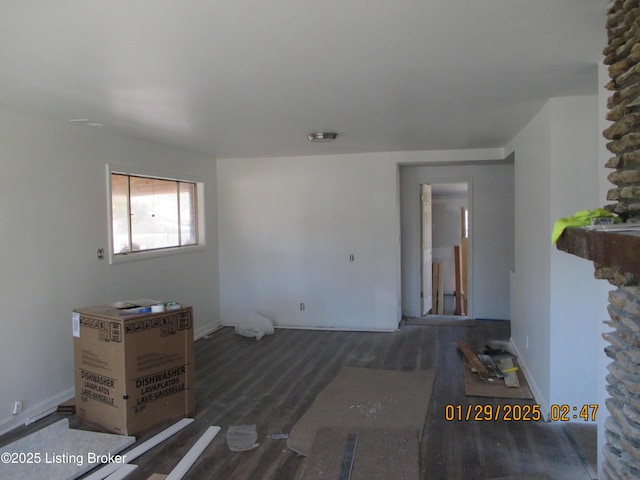 empty room featuring dark hardwood / wood-style flooring