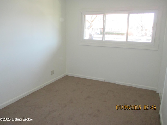 empty room featuring carpet