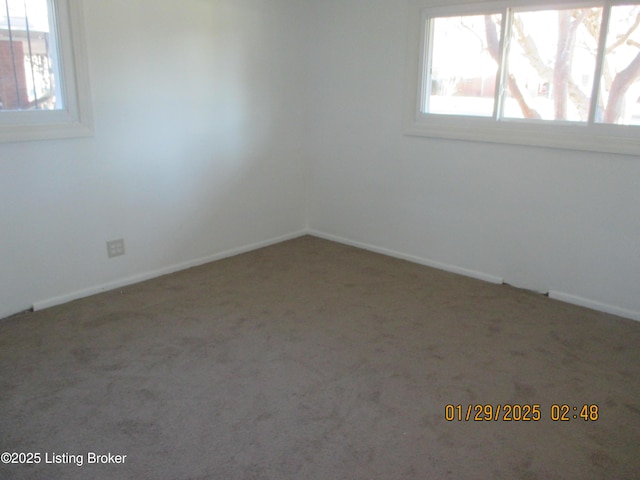 unfurnished room featuring carpet floors