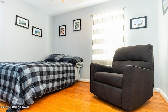 bedroom featuring wood-type flooring