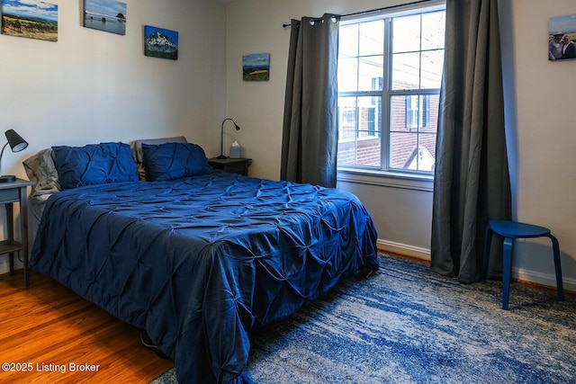 bedroom featuring hardwood / wood-style flooring