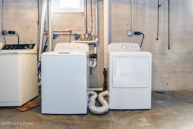 laundry room featuring washing machine and dryer