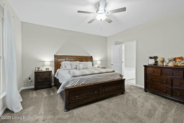 bedroom with ceiling fan and light colored carpet