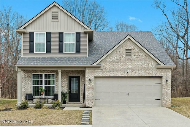 view of front facade featuring a garage and covered porch