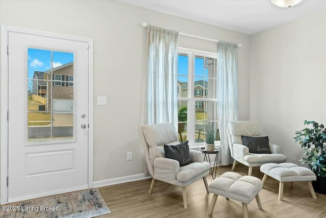 sitting room with light wood-type flooring