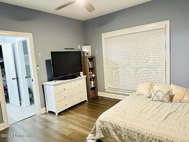 bedroom featuring hardwood / wood-style flooring and ceiling fan