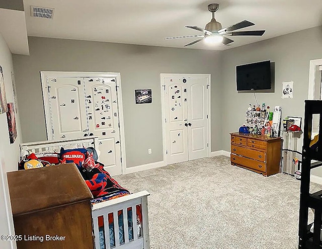 carpeted bedroom featuring ceiling fan