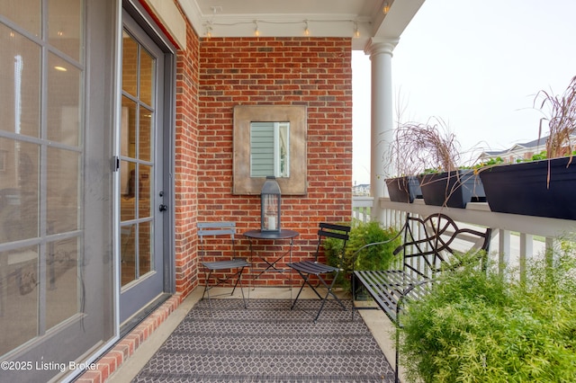 balcony featuring a porch