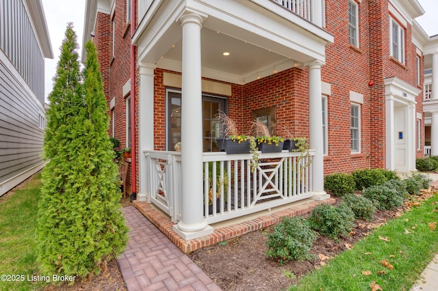 view of side of home featuring a porch