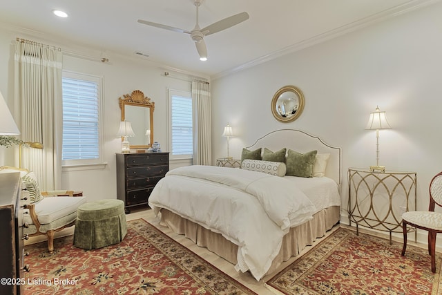 bedroom featuring crown molding and ceiling fan