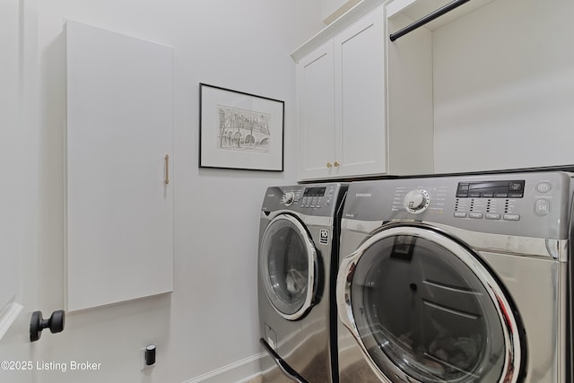 washroom with cabinets and separate washer and dryer