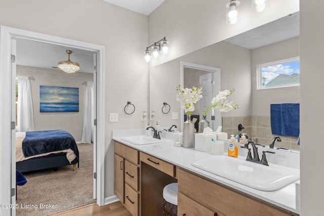 bathroom featuring vanity and wood-type flooring