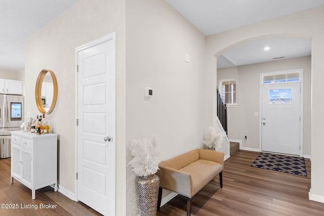 entrance foyer with light hardwood / wood-style flooring