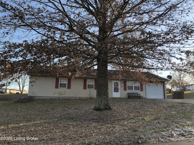 single story home with a garage