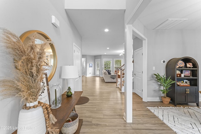 foyer entrance with light hardwood / wood-style flooring