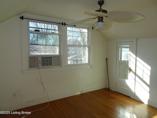 bonus room featuring cooling unit, lofted ceiling, a wealth of natural light, and light wood-type flooring