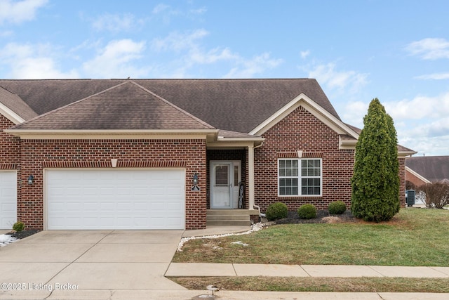 ranch-style home featuring a garage and a front lawn